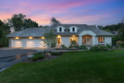 Exquisite Jyland Custom-Built masterpiece with no detail overlooked. This picturesque home is perfectly nestled on a secluded, 0.53-acre wooded lot in the highly desirable Bryant Pointe neighborhood! | Image 1