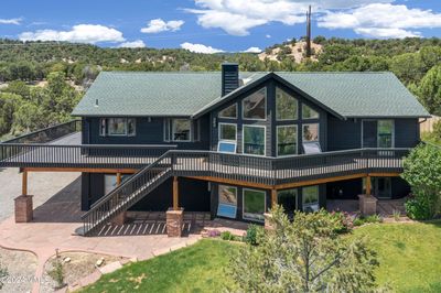 Front view of home looking over the top with BLM open space behind. | Image 2