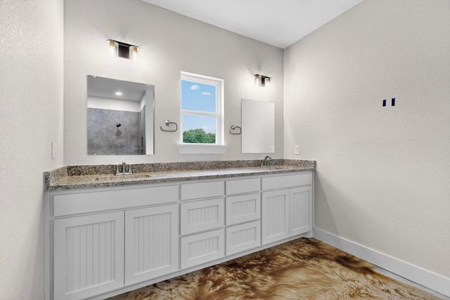 Full bath with a tile shower and double vanity | Image 30