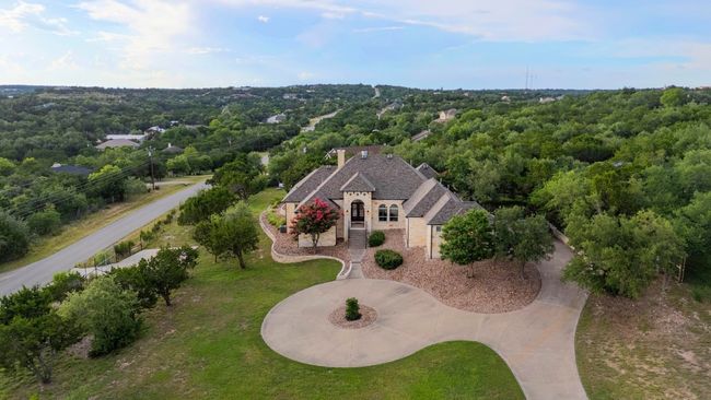 View from above of property with a heavily wooded area | Image 36
