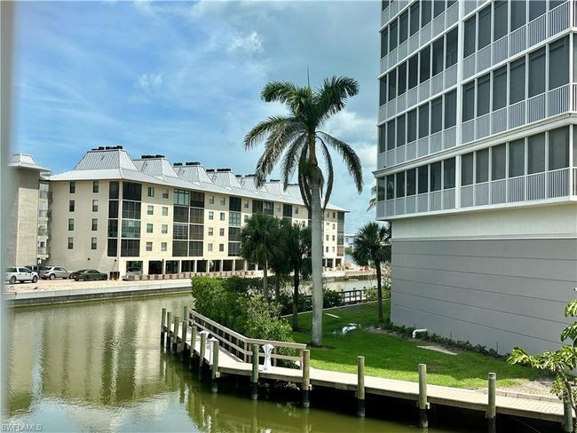 Dock area featuring a water view | Image 15