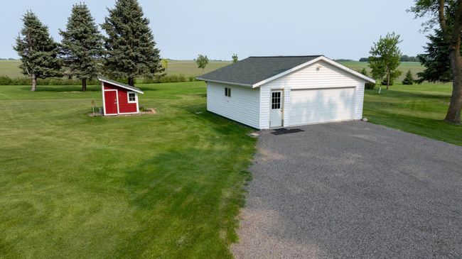 Detached Double garage 1997 - but moved to new location on the property poured new floor with Electric in floor heat! | Image 54