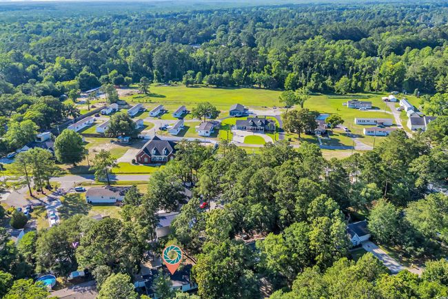 View of property location featuring a forest | Image 28