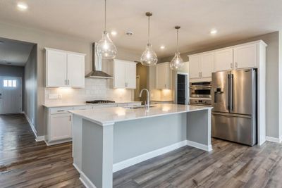 (*Photo of inventory home, actual homes colors and finishes will vary) Enjoy a beautiful chef ready gourmet kitchen! | Image 2