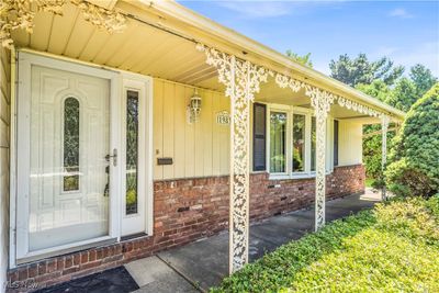 Entrance to property featuring a porch | Image 2