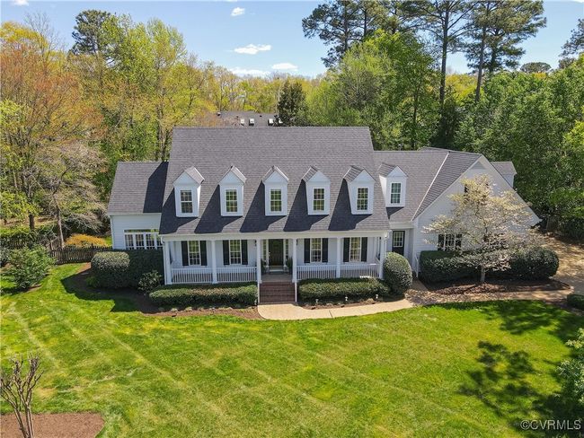 Cape cod home featuring a front lawn, a shingled roof, and covered porch | Image 43