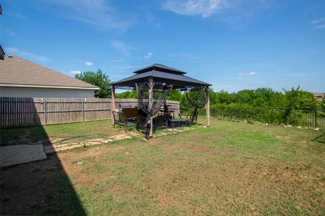 View of yard with a gazebo | Image 24