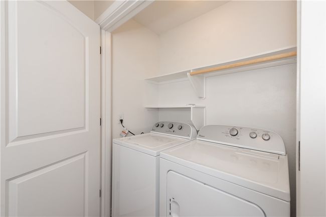 Washroom featuring washer and dryer and laundry area | Image 14
