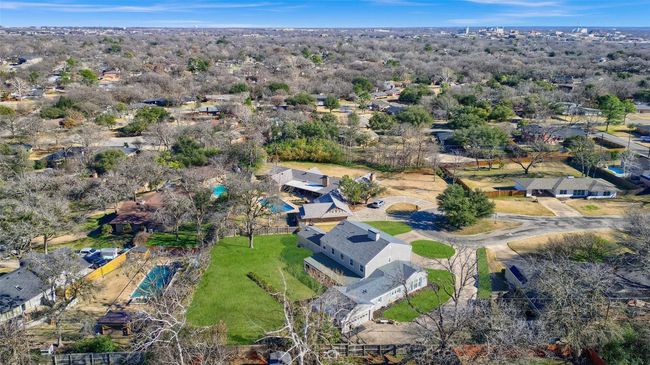 Aerial view of property's location with nearby suburban area | Image 38