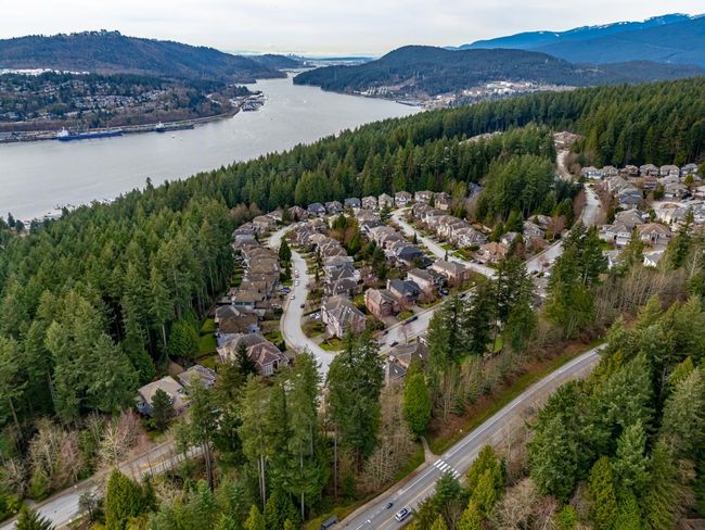Drone / aerial view featuring a water and mountain view and a view of trees | Image 40
