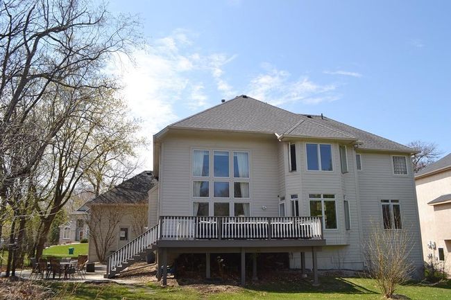 Deck has stair to the patio and firepit | Image 70