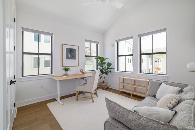 Secondary bedroom with vaulted ceilings and large closet | Image 17