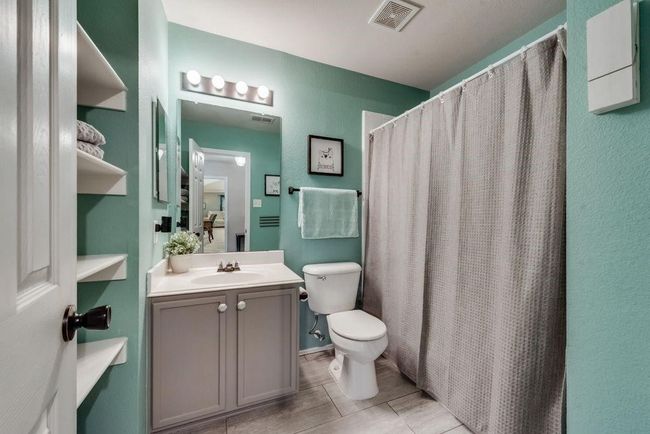 Full bathroom featuring toilet and vanity | Image 18