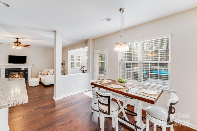 Open breakfast space overlooking deck iand tree lined back yard! | Image 22