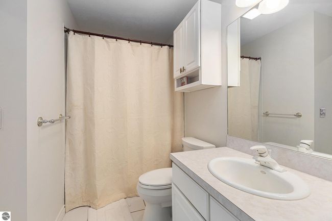 301 Golfview Ln, House other with 2 bedrooms, 2 bathrooms and null parking in Elk Rapids MI | Image 24