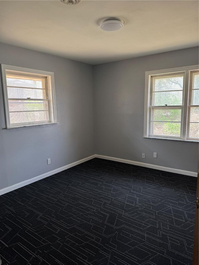 Unfurnished room featuring baseboards | Image 15