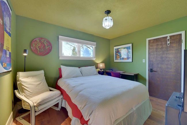 Bedroom featuring wood finished floors | Image 28