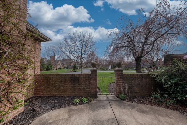 Charming "Courtyard-Style enclosed patio off Liv Rm and MBR. | Image 5