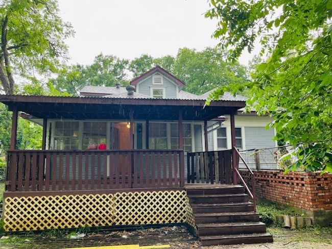 Rear view of property with a porch | Image 32
