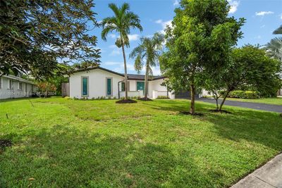 1984 Nw 86th Ter, House other with 3 bedrooms, 2 bathrooms and null parking in Coral Springs FL | Image 3