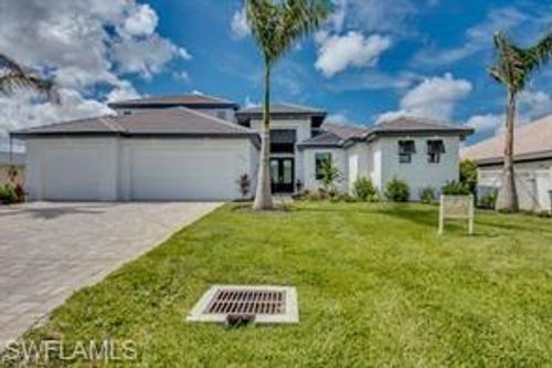1732 Se 40th Ter, Cape Coral, FL, 33904-7489 | Card Image