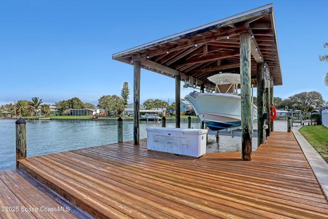 1061 Bali Rd, House other with 4 bedrooms, 2 bathrooms and null parking in Cocoa Beach FL | Image 56