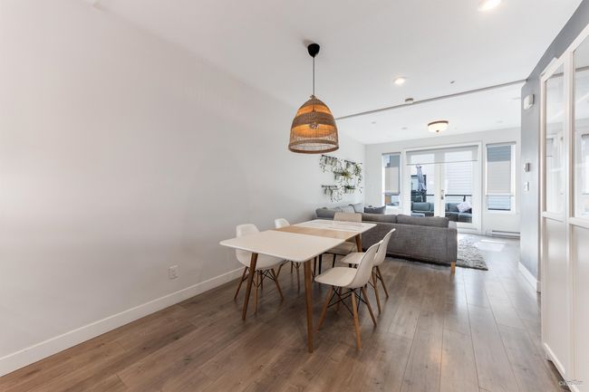 Dining space featuring recessed lighting, wood finished floors, and baseboards | Image 9