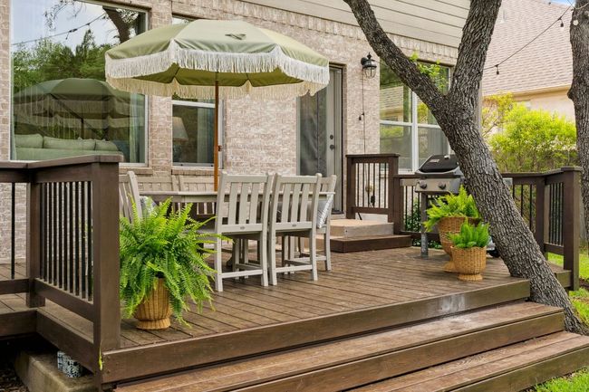 The deck is well shaded by a mature shade tree, while the whole backyard is well shaded in the late afternoon hours. | Image 32