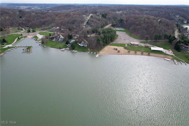 Aerial showing the marina, the main beach and clubhouse | Image 48