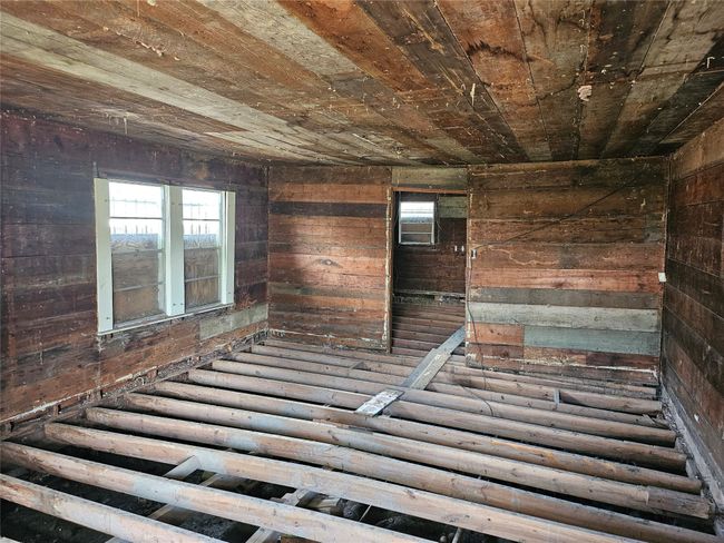 Miscellaneous room with wood walls and wood ceiling | Image 5
