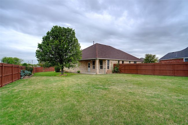 View of yard featuring a fenced backyard | Image 27