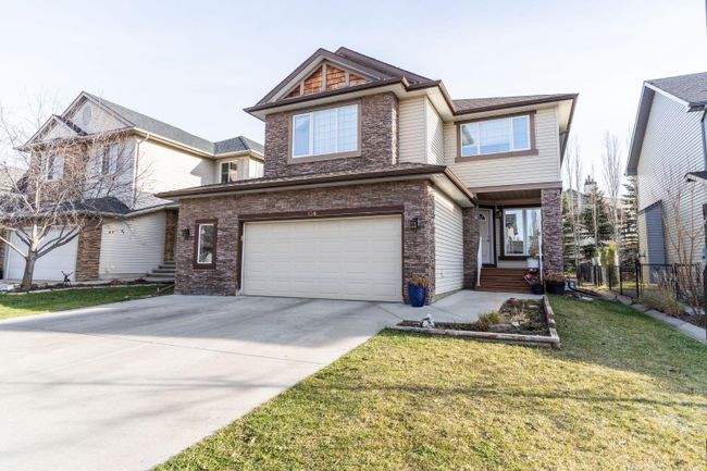 136 Crystal Green Drive, Home with 4 bedrooms, 3 bathrooms and 4 parking in Okotoks AB | Image 1