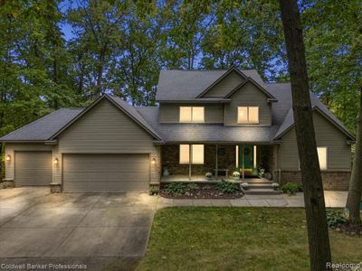 7111 Tucker Road, Home with 4 bedrooms, 3 bathrooms and null parking in Groveland Twp MI | Image 1