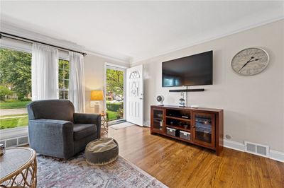 Sitting room featuring ornamental molding and hardwood / wood-style floors | Image 3