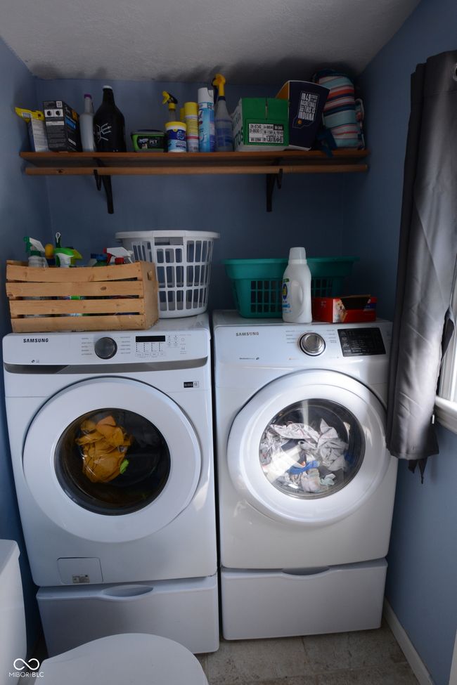 laundry area with washing machine and dryer, baseboards, and laundry area | Image 29