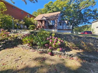 View of front of home with a deck | Image 3