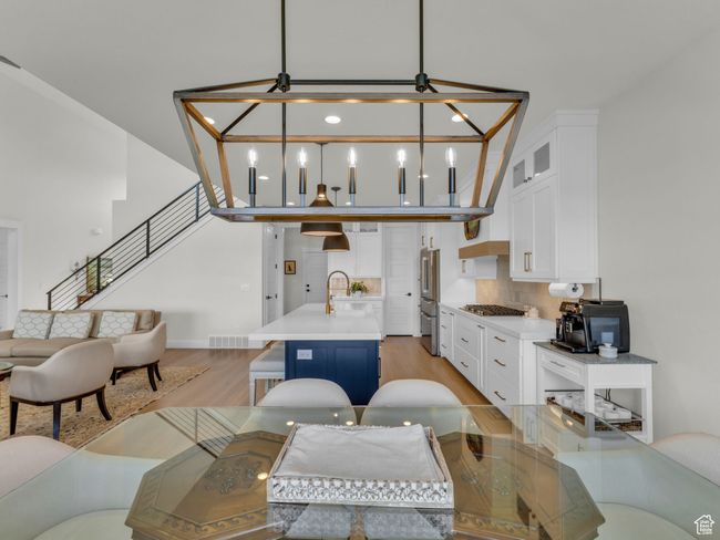 Living area featuring light wood-style floors and stairway | Image 19