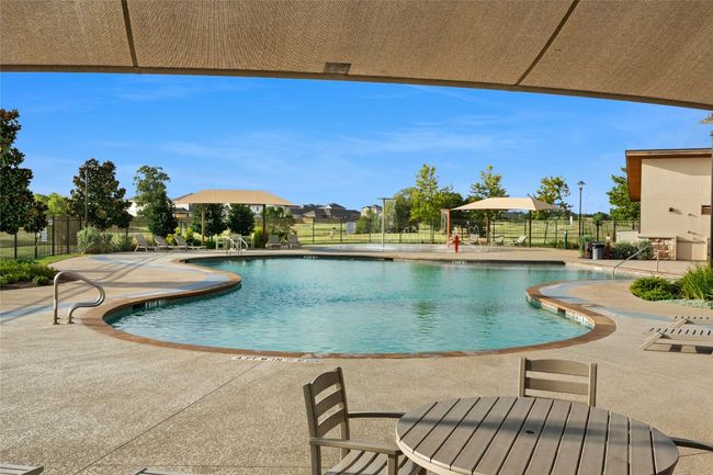 Community pool featuring a patio | Image 20