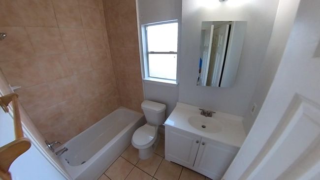 1 of the 2 bathrooms in the 5508 Texas upstairs unit. | Image 8