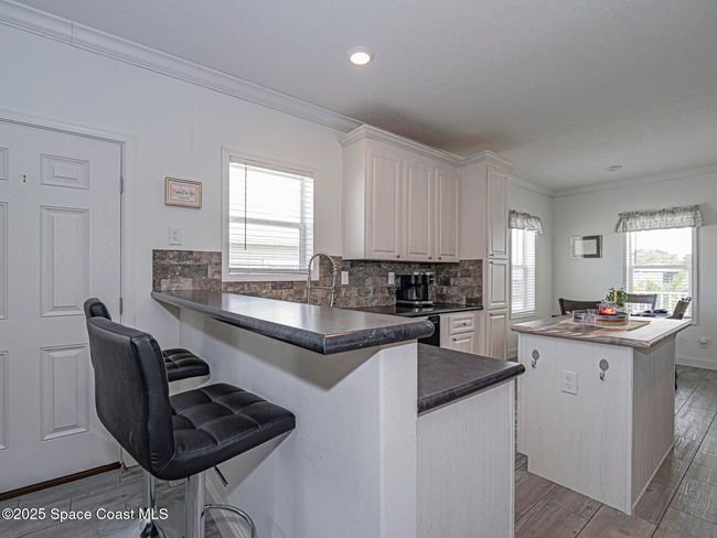 623 Hyacinth Cir, House other with 3 bedrooms, 2 bathrooms and null parking in Barefoot Bay FL | Image 10