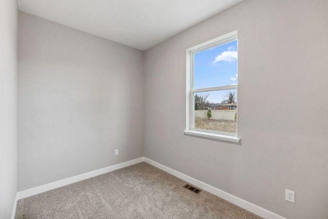 Main floor flex room perfect for working from home, hobbies, or a toy room. Model home. Options and colors will vary. | Image 17