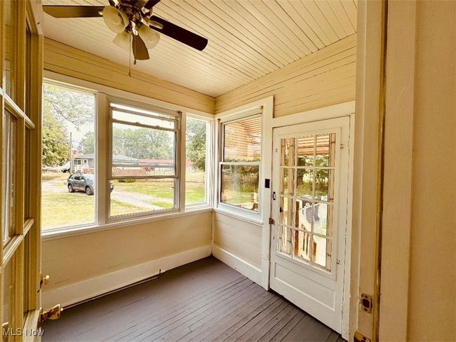Nice sunroom off living room, that could serve as an office | Image 7