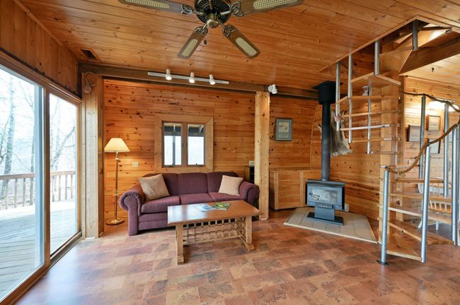 The wood stove provides heat. | Image 73
