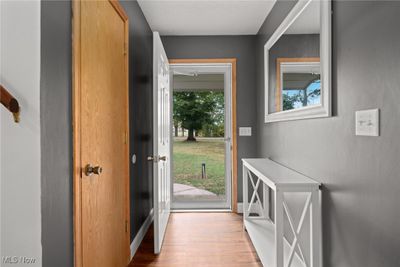 Doorway featuring light hardwood / wood-style flooring | Image 3