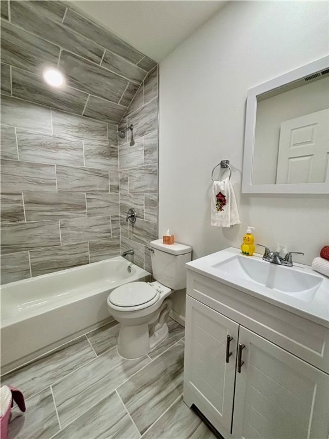 All new custom tile work tub / shower combo new vanity sink fixtures | Image 46