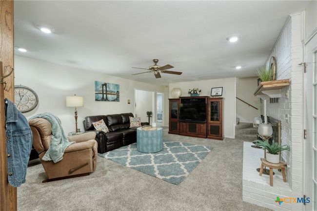 Den/Family room with fireplace | Image 12