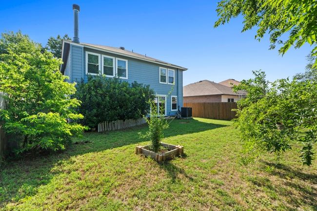 View of yard with central AC | Image 33