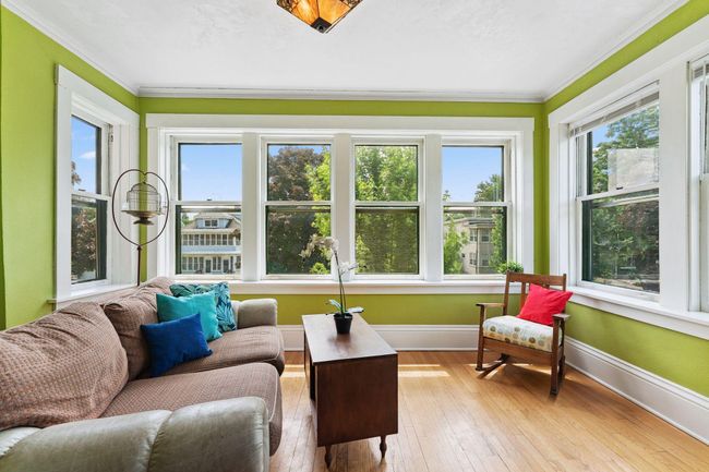 Sunroom - this room could be an office, tv room or place to relax and read books. | Image 7