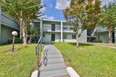 103 - 14417 Americana Circle, Condo with 3 bedrooms, 2 bathrooms and null parking in Tampa FL | Image 1