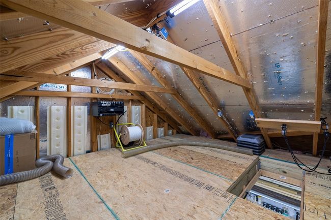 . Climate controlled 2 car garage plus storage above in attic with pull down stairs. | Image 15